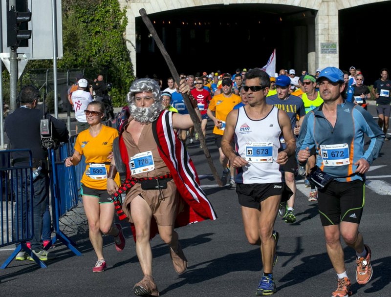 Moses splits the runners at the 2014 Jerusalem Marathon
